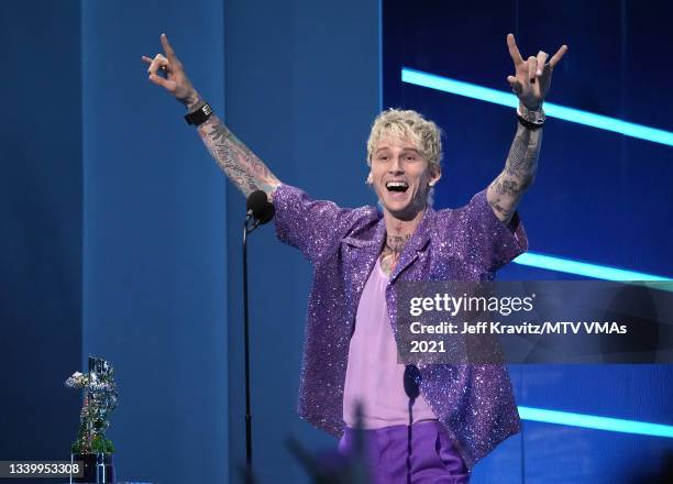 Machine Gun Kelly accepts the Best Alternative award for "My Ex's Best Friend" onstage during the 2021 MTV Video Music Awards at Barclays Center on...