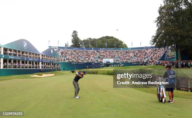 Billy Horschel of the United States of America plays his third shot on the 18th hole during Day Four of The BMW PGA Championship at Wentworth Golf...