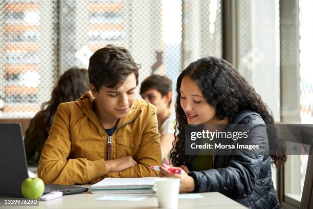 university students studying in classroom - classroom laptop stock pictures, royalty-free photos & images