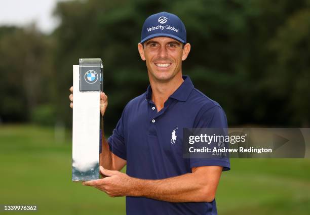 Billy Horschel of the United States of America poses with the trophy after winning The BMW PGA Championship at Wentworth Golf Club on September 12,...