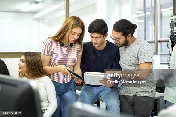 students learning over network server in computer lab - college students computer lab stock pictures, royalty-free photos & images