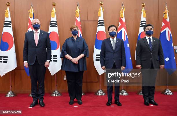 Australia's Defence Minister Peter Dutton and Foreign Minister Marise Payne pose with South Korea's Foreign Minister Chung Eui-yong and Defence...