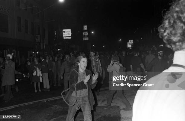 During an anti-war demonstration in Harvard Square, a female protestor screams as the policemen charge the crowd, Cambridge, Massachussetts, April...