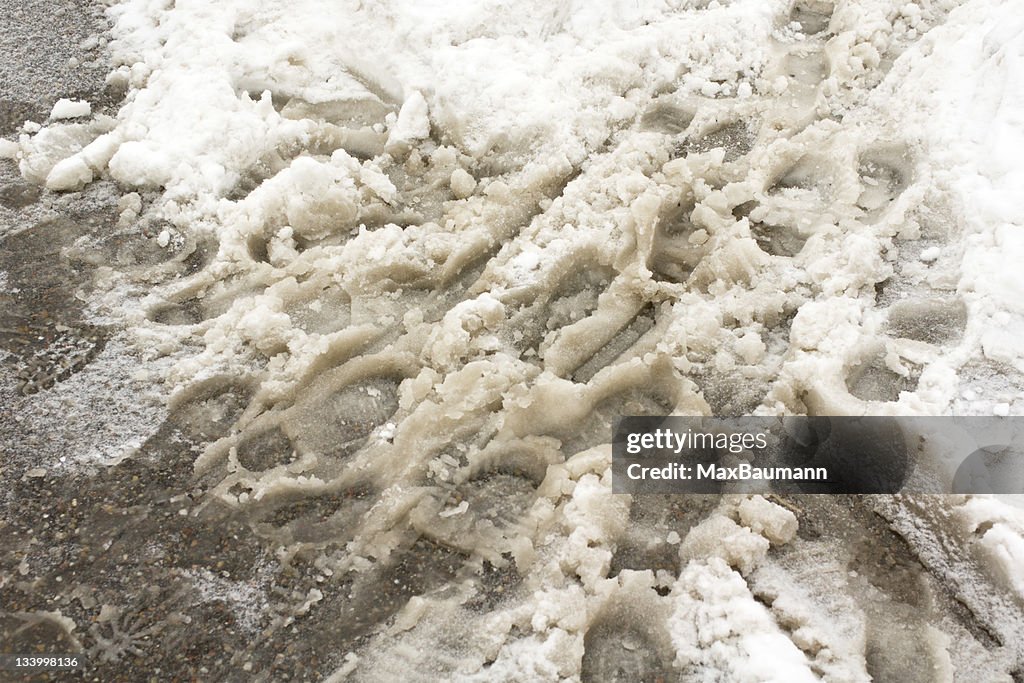 Foot steps in snow slush