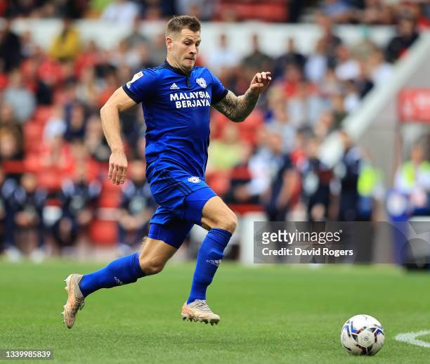 James Collins of Cardiff City chases the ball during the Sky Bet Championship match between Nottingham Forest and Cardiff City at City Ground on...