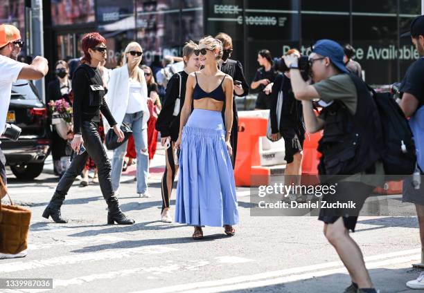 Jenny Walton is seen wearing a blue Khaite skirt and black bralette outside the Khaite show during New York Fashion Week S/S 22 on September 12, 2021...