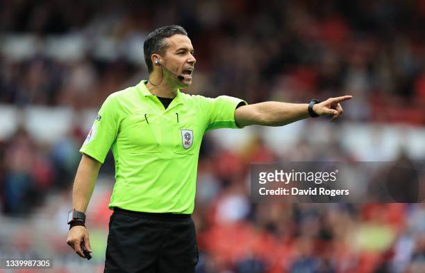 Dean Whitestone, the referee, issues instructions during the Sky Bet Championship match between Nottingham Forest and Cardiff City at City Ground on...