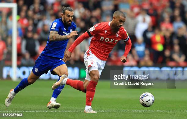 Lewis Grabban of Nottingham Forest moves away from Marlon Pack during the Sky Bet Championship match between Nottingham Forest and Cardiff City at...