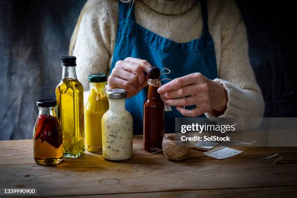 christmas day gifts of oil's & food dressings - christmas craft stock pictures, royalty-free photos & images