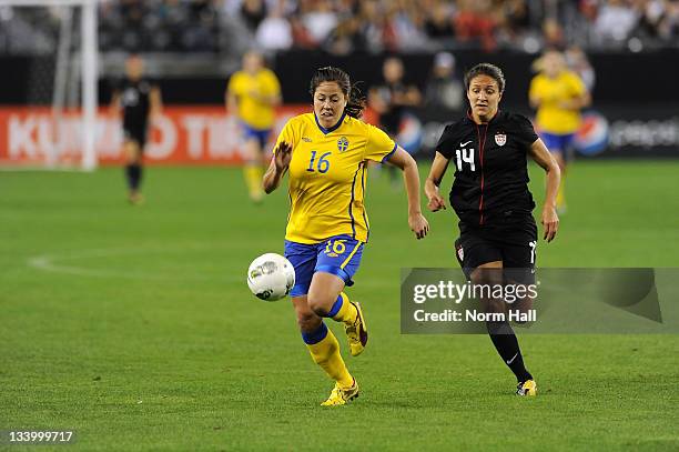 Madelaine Edlund of the Sweden National Women's Soccer Team brings the ball up field against the U.S. Women's National Soccer Team at University of...