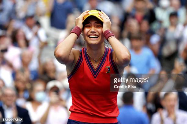 Emma Raducanu of Great Britain celebrates winning match point to defeat Leylah Annie Fernandez of Canada during the second set of their Women's...