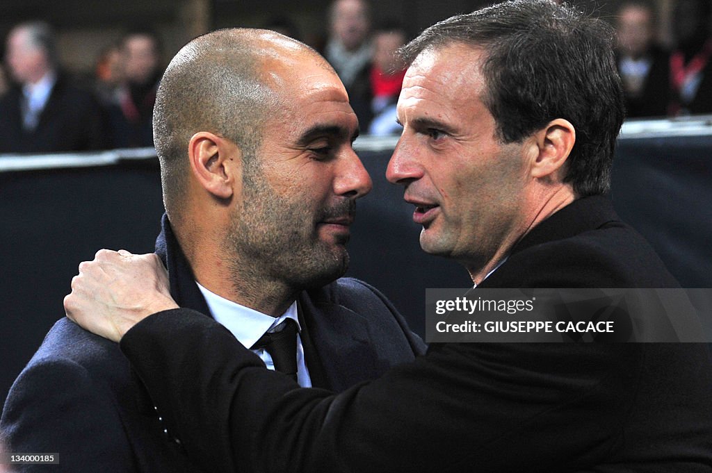Barcelona's coach Josep Guardiola (L) an