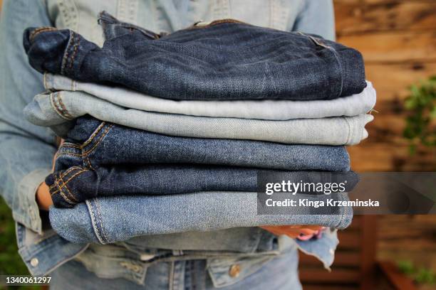 denim - denim coat stock pictures, royalty-free photos & images