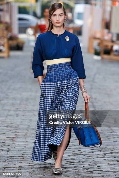Model walks the runway during the Tory Burch Ready to Wear Spring/Summer 2022 fashion show as part of the New York Fashion Week on September 12, 2021...