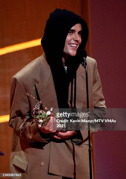 Justin Bieber accepts the Artist of the Year award onstage during the 2021 MTV Video Music Awards at Barclays Center on September 12, 2021 in the...