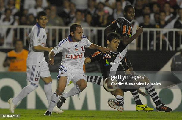 Juninho Pernambucano of Vasco Da Gama and Lorenzetti of U de Chile during a match between Vasco Da Gama and U de Chile as part of the Copa...