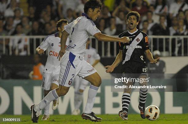 Juninho Pernambucano of Vasco Da Gama and Rojas of U de Chile during a match between Vasco Da Gama and U de Chile as part of the Copa Bridgestone...