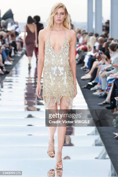 Model walks the runway during the Dundas X Revolve Ready to Wear Spring/Summer 2022 fashion show as part of the New York Fashion Week on September 8,...