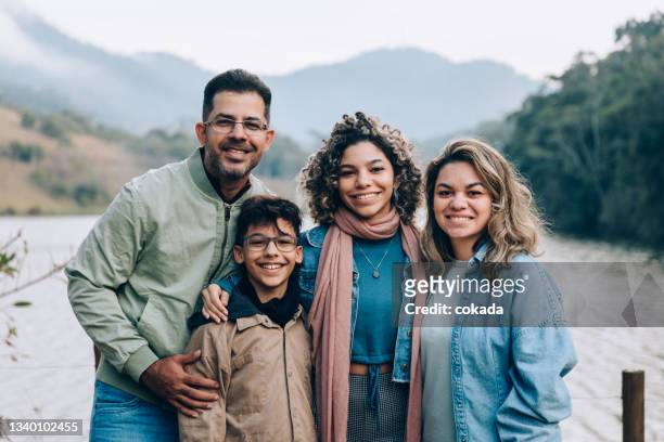 brazilian family portrait - four people stock pictures, royalty-free photos & images