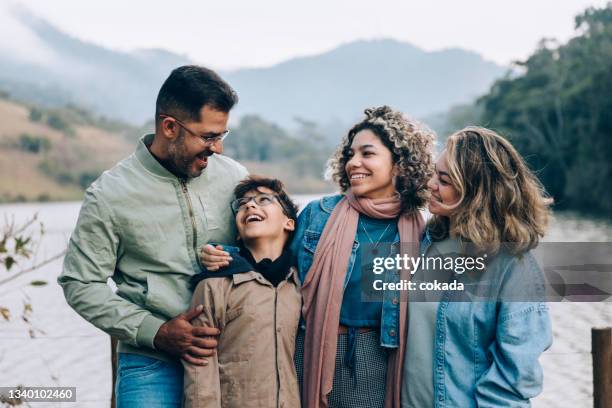 brazilian family portrait - four people smiling stock pictures, royalty-free photos & images