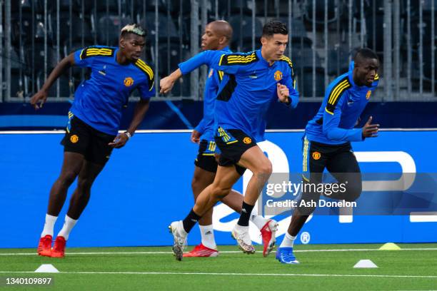 Paul Pogba, Cristiano Ronaldo, Eric Bailly of Manchester United in action during a first team training session at Stadion Wankdorf on September 13,...