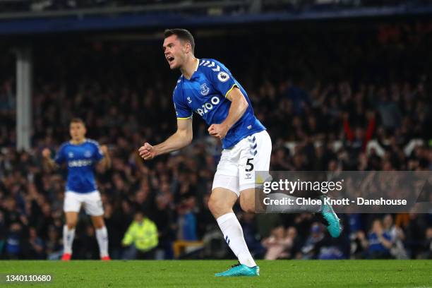 Michael Keane of Everton celebrates scoring his teams first goal during the Premier League match between Everton and Burnley at Goodison Park on...