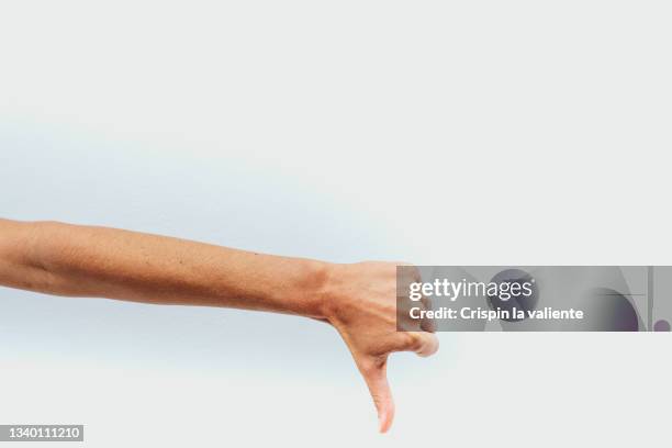 humb down isolated on white background, concept of negative, bad news - polegar para baixo imagens e fotografias de stock