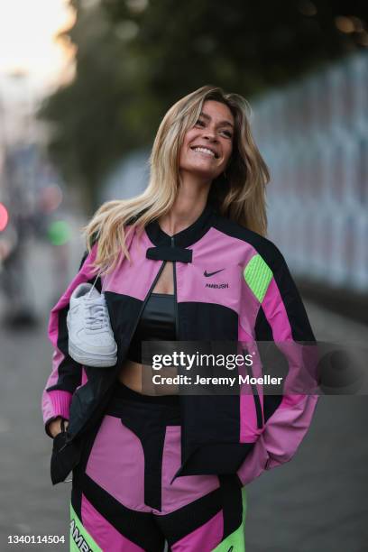 Swantje Paulina wearing a nike two piece, white nike air force on September 11, 2021 in Berlin, Germany.