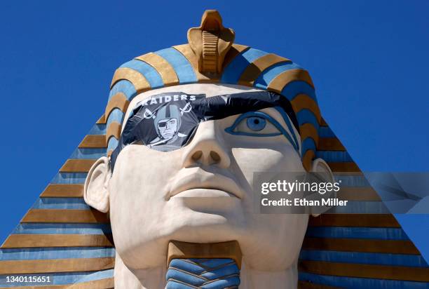 Las Vegas Raiders eye patch adorns the 110-foot-tall larger replica of the Great Sphinx at Giza at Luxor Hotel and Casino before the Raiders'...