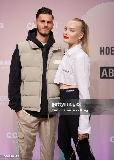 Nino Sifkovits and Cheyenne Ochsenknecht attend the Hoermanseder X ABOUT YOU show during the ABOUT YOU Fashion Week Autumn/Winter 21 at Kraftwerk on...