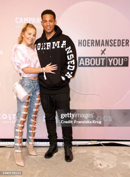 Ina Aogo and Denis Aogo attend the Hoermanseder X ABOUT YOU show during the ABOUT YOU Fashion Week Autumn/Winter 21 at Kraftwerk on September 13,...