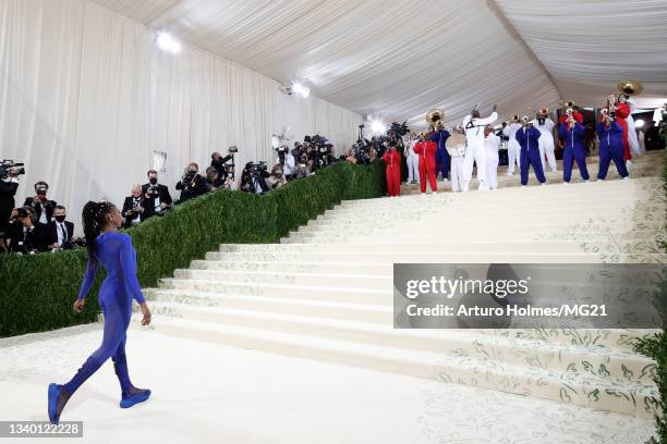Gymnast Nia Dennis and the Brooklyn United Marching Band attend The 2021 Met Gala Celebrating In America: A Lexicon Of Fashion at Metropolitan Museum...