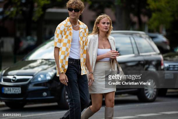Couple Christopher Stampe and Signe Kragh is seen during About You Fashion Week on September 13, 2021 in Berlin, Germany.