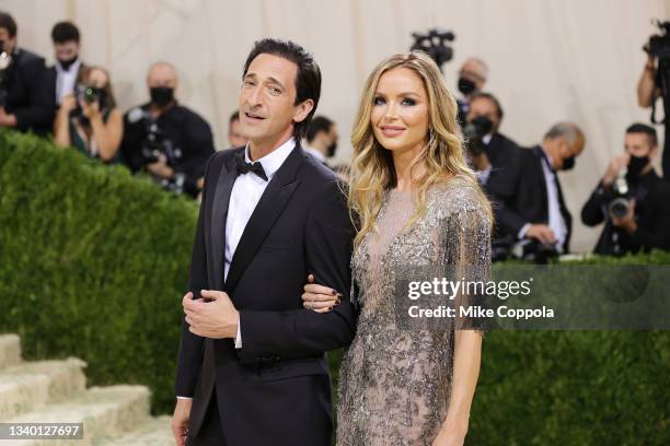 Adrien Brody and Georgina Chapman attend The 2021 Met Gala Celebrating In America: A Lexicon Of Fashion at Metropolitan Museum of Art on September...