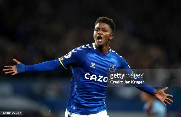 Demarai Gray of Everton celebrates after scoring their team's third goal during the Premier League match between Everton and Burnley at Goodison Park...