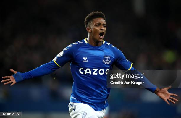 Demarai Gray of Everton celebrates after scoring their team's third goal during the Premier League match between Everton and Burnley at Goodison Park...