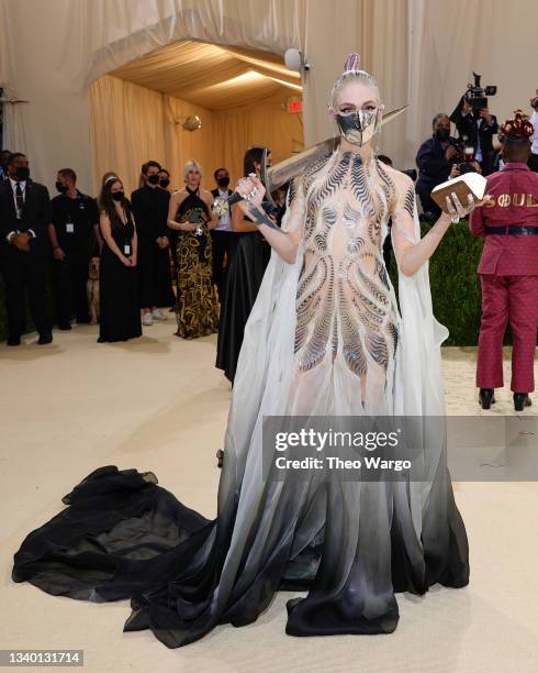 Grimes attends The 2021 Met Gala Celebrating In America: A Lexicon Of Fashion at Metropolitan Museum of Art on September 13, 2021 in New York City.