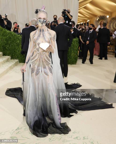Grimes attends The 2021 Met Gala Celebrating In America: A Lexicon Of Fashion at Metropolitan Museum of Art on September 13, 2021 in New York City.
