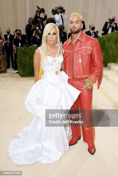 Donatella Versace and Maluma attend The 2021 Met Gala Celebrating In America: A Lexicon Of Fashion at Metropolitan Museum of Art on September 13,...