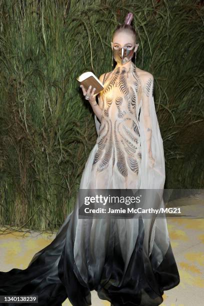 Grimes attends the The 2021 Met Gala Celebrating In America: A Lexicon Of Fashion at Metropolitan Museum of Art on September 13, 2021 in New York...