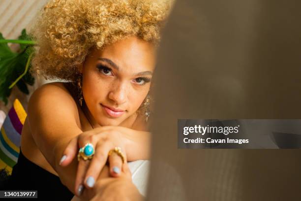 portrait of a woman looking at camera - flash eyelashes stock pictures, royalty-free photos & images