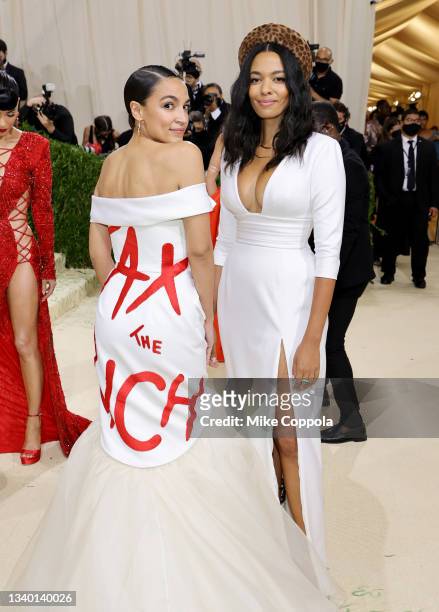 Alexandria Ocasio-Cortez and Aurora James attend The 2021 Met Gala Celebrating In America: A Lexicon Of Fashion at Metropolitan Museum of Art on...