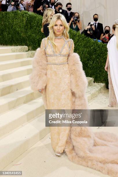 Sienna Miller attends The 2021 Met Gala Celebrating In America: A Lexicon Of Fashion at Metropolitan Museum of Art on September 13, 2021 in New York...