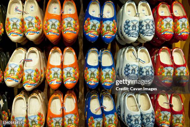 painted clogs at souvenir shop in zaanse schans - zaandam stock pictures, royalty-free photos & images