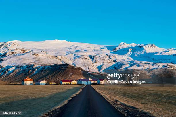 remote farm at the edge of eyjafjallajokull in south iceland - eyjafjallajokull glacier stock pictures, royalty-free photos & images