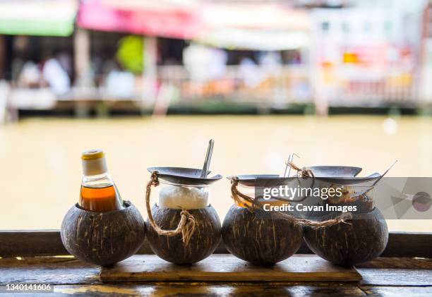 traditional thai condiments at outdoor restaurant - nuoc cham stock pictures, royalty-free photos & images