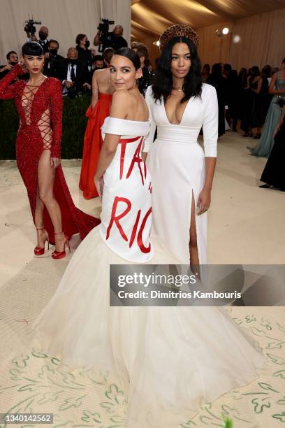 Megan Fox, Alexandria Ocasio-Cortez, and Aurora James attend The 2021 Met Gala Celebrating In America: A Lexicon Of Fashion at Metropolitan Museum of...