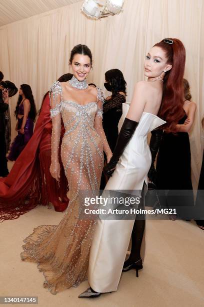 Kendall Jenner and Gigi Hadid attend The 2021 Met Gala Celebrating In America: A Lexicon Of Fashion at Metropolitan Museum of Art on September 13,...