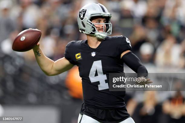 Derek Carr of the Las Vegas Raiders looks to pass against the Baltimore Ravens at Allegiant Stadium on September 13, 2021 in Las Vegas, Nevada.