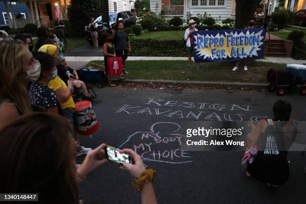 Pro-choice activists protest outside the house of U.S, Supreme Court Associate Justice Brett Kavanaugh September 13, 2021 in Chevy Chase, Maryland....